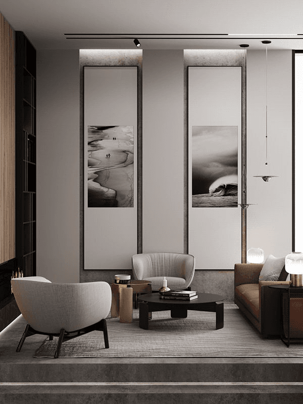 I-Studio designed living room with framed black-and-white artwork.